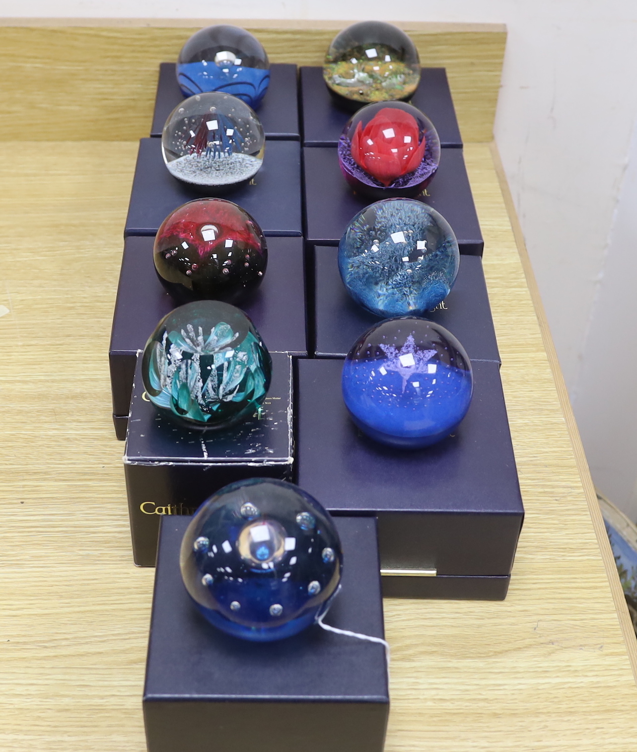 Nine Caithness paperweights, boxed, some limited edition